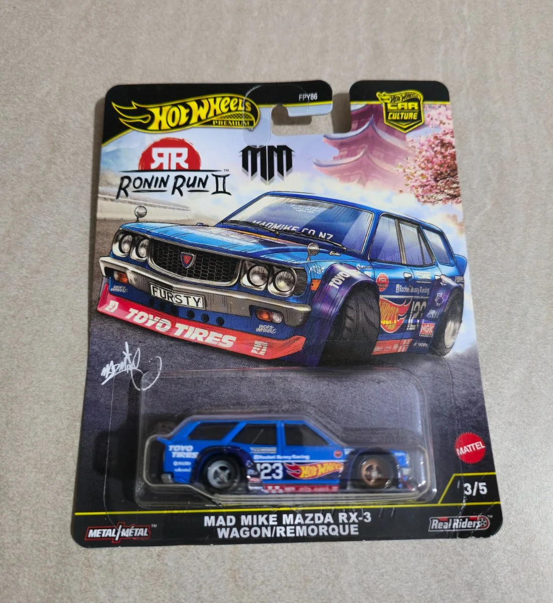 Hot Wheels Mad Mike Mazda RX-3 Wagon 1:64
