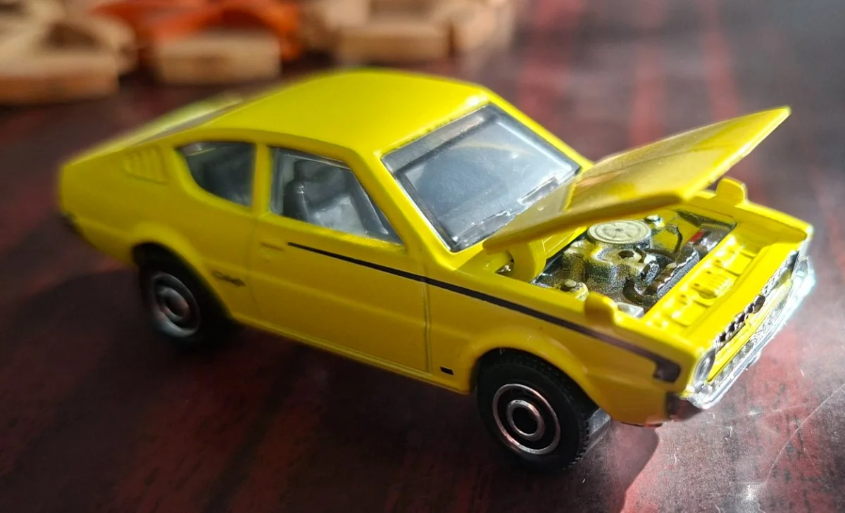 AutoArt Mitsubishi 1975 Lancer Celeste (Matchbox) 1:64