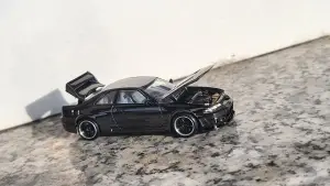 Pop Race Nissan skyline r33 1:64 - Minigaraža
